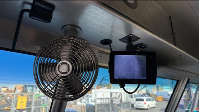 Cab fan and backup camera screen above the windshield